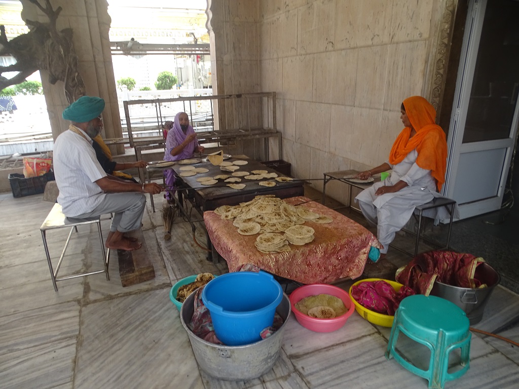 Gurudwara Sis Ganj Sahib (Chandni Chowk Road, Old Delhi) Volunteers Making Rotis at Community Kitchen